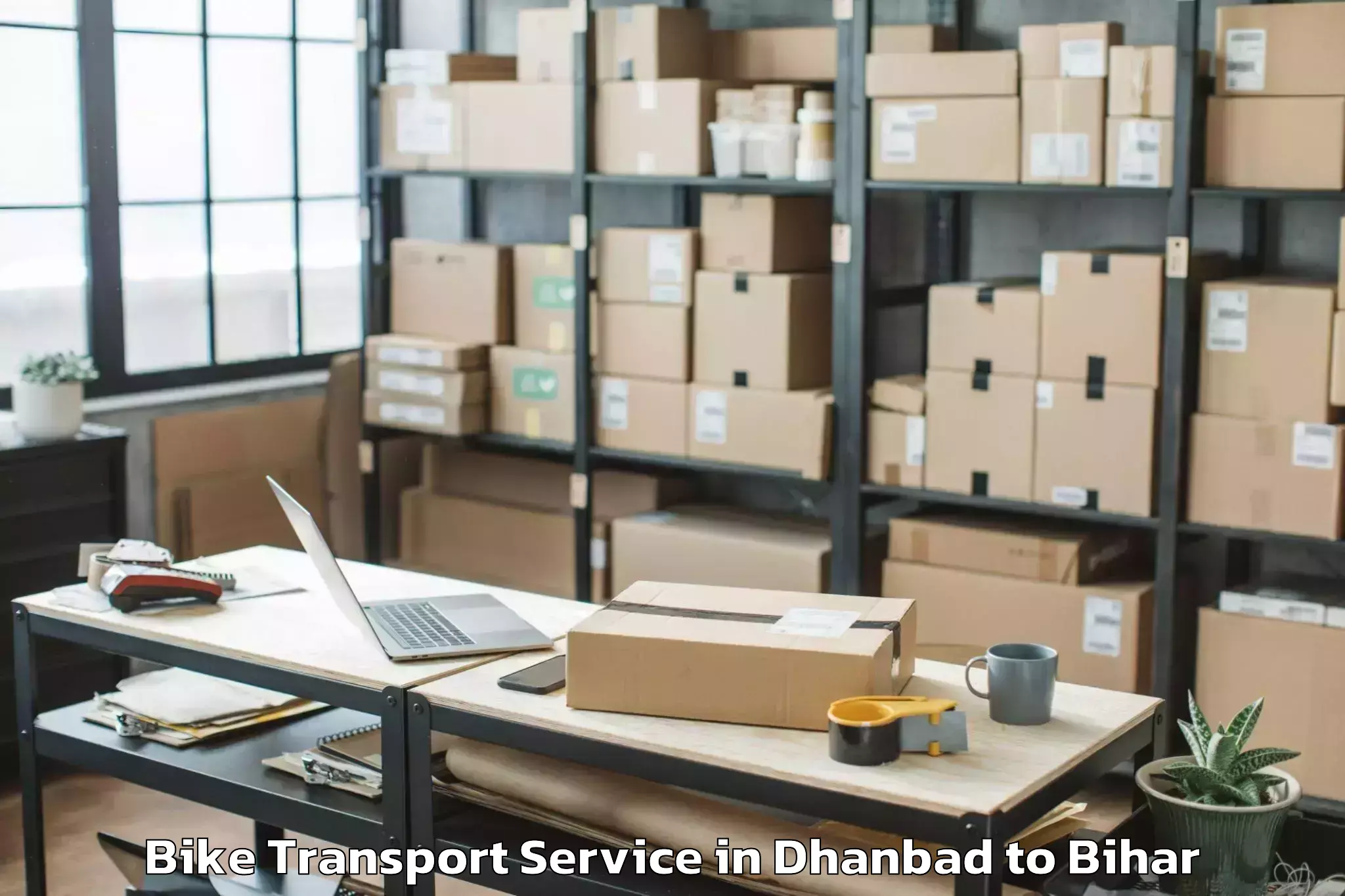 Top Dhanbad to Karwa Tariyani Bike Transport Available